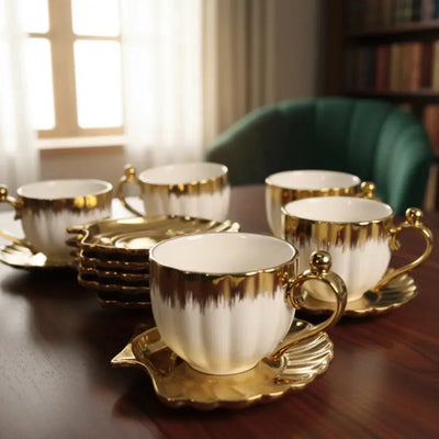 Luxury White & Gold Cup Set with Fan-Shaped Plates Qatar