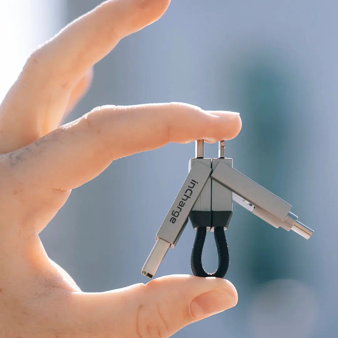 Rolling Square In-Charge® 6-in-1 Charging Cable Mercury Gray – Compact EDC Keyring Charger
